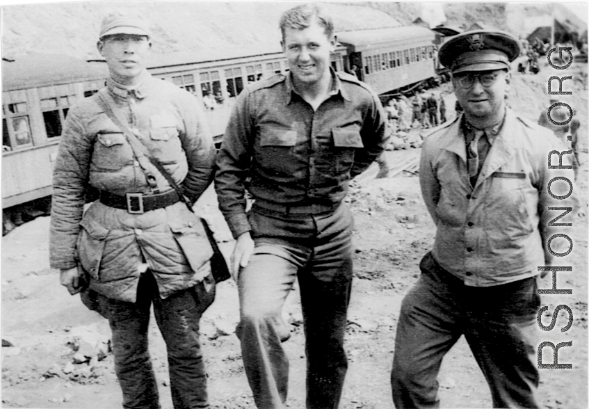 "The officer in the center is Lt. Sohl engineering officer of the 396th. The officer on the right is Capt. Weisburg a medical officer with the 396th. Unfortunately Lt.Sohl did not make it back to the states. He had his orders to return stateside and was awaiting transportation home when he was bitten by a rat and became very ill. Three days later he passed away. He was a fine officer respected by all that came in contact with him."