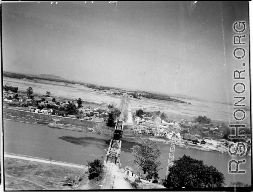 Bombing of Đáp Cầu railway bridge in French Indochina (Vietnam), during WWII. In northern Vietnam, and along a critical rail route used by the Japanese.