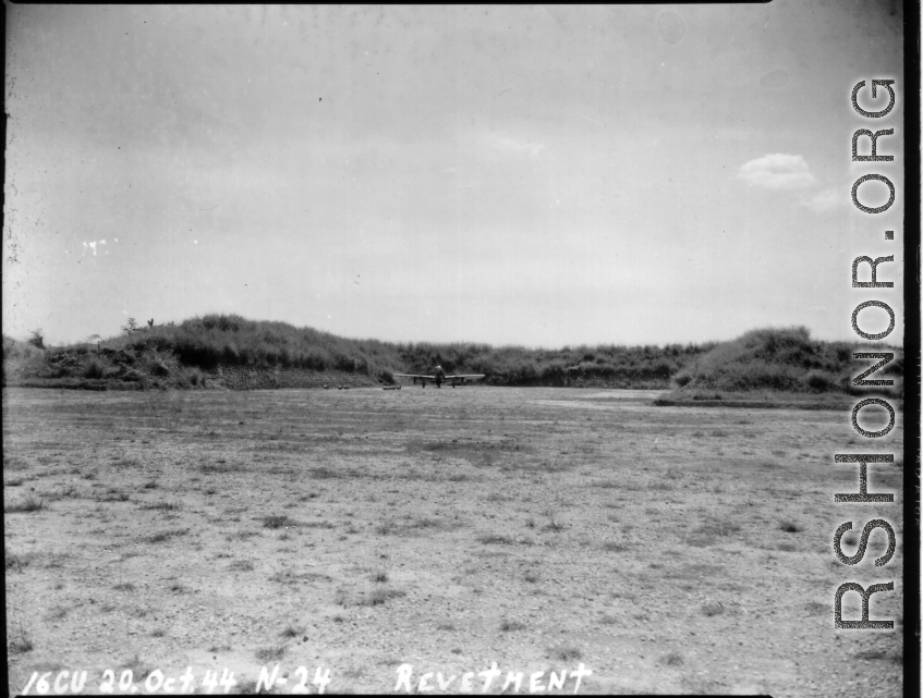 16CU Oct 20th, 1944 N-24 Revetment  A P-51 fighter plane in a forlorn revetment in the CBI during WWII.