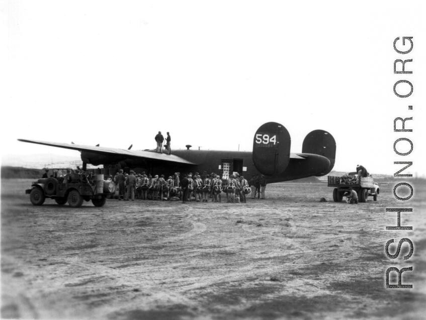 Chinese paratroops getting ready to board a converted B-24, tail number #330594.  Image from U. S. Government official sources. 