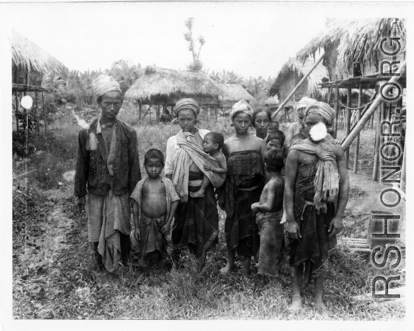 Local people in Burma near the 797th Engineer Forestry Company--Men, women, Children, in Burma.  During WWII.