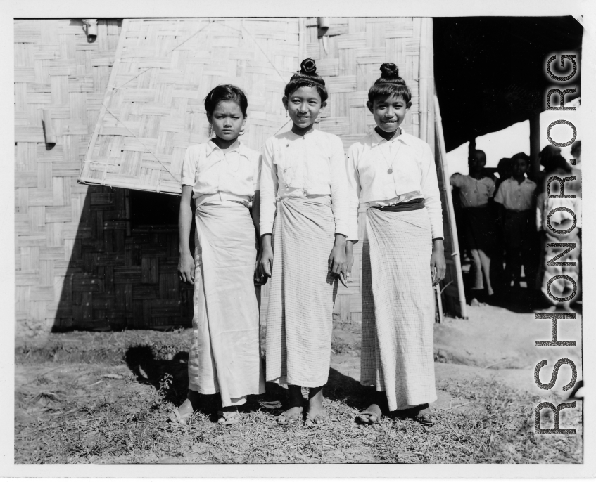 Local people in Burma near the 797th Engineer Forestry Company--three girls.  During WWII.