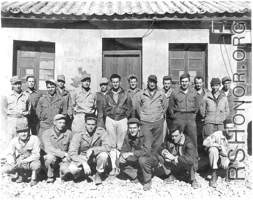 Flyers and staff pose before 373rd Bombardment Squadron offices in China during WWII.