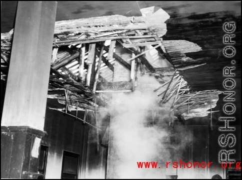 Bomb damage to a building at an American base in China during WWII.