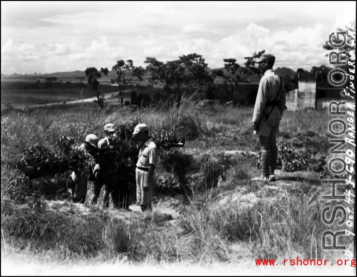 Chinese crews work at a range finder, almost certainly in Liuzhou, October 9, 1944.    From the collection of Hal Geer.