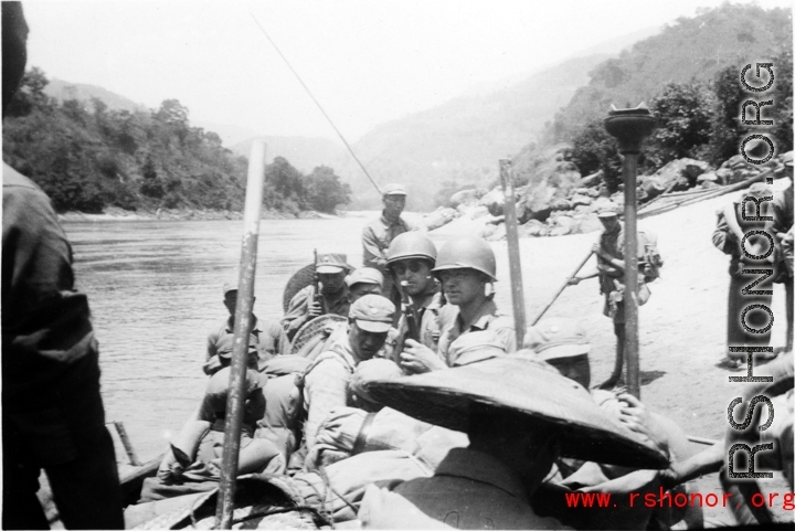 Chinese and American troops on a river in Yunnan province, China, during WWII.