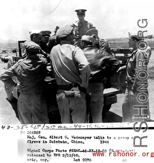 Maj. Gen. Albert C. Wedemeyer talks to a group of flyers in Suichwan (Suichuan), China, in 1944, during WWII.