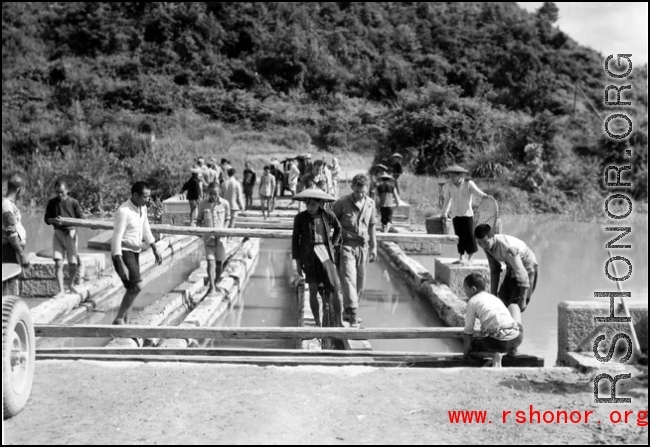 Bridge demolition during the evacuation before the Japanese Ichigo advance in 1944, in Guangxi province.