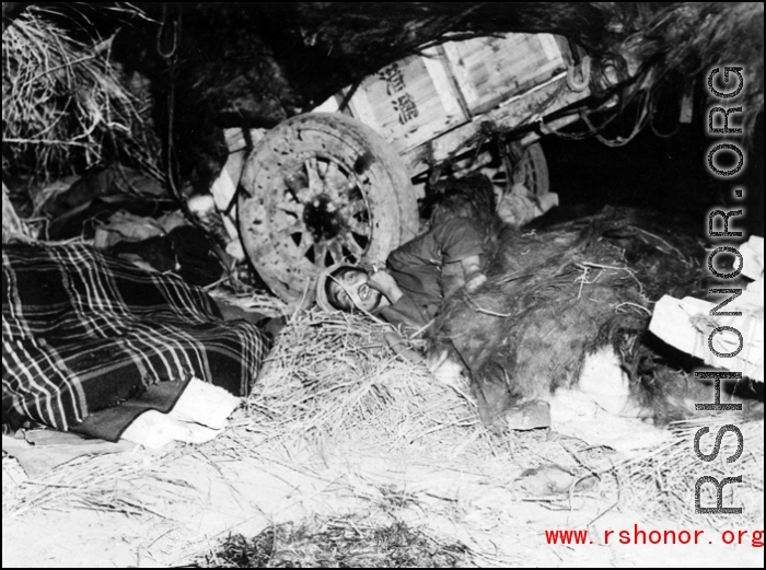 Refugees rest while fleeing during the evacuation before the Japanese Ichigo advance in 1944, in Guangxi province.