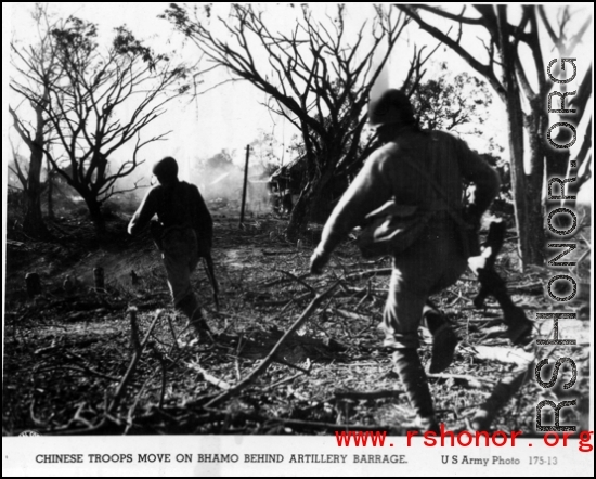 Chinese troops move on Bhamo behind artillery barrage. In the CBI. US Army photo.