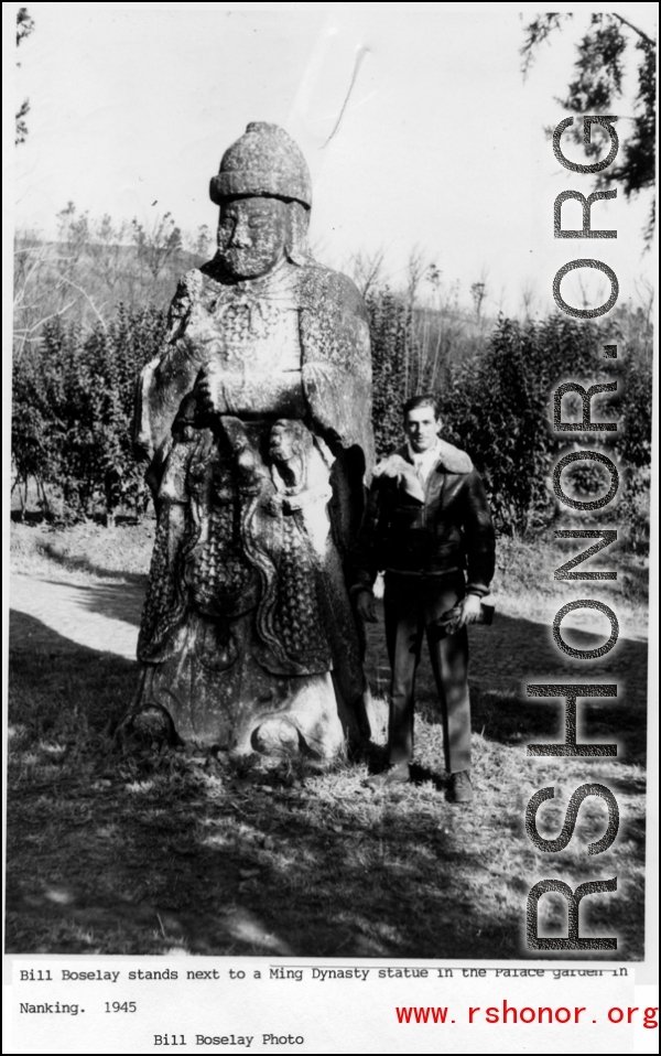 Bill Boselay stands next to a Ming Dynasty statue in the Palace Garden in Nanjing, 1945.  Photo from Bill Boselay.