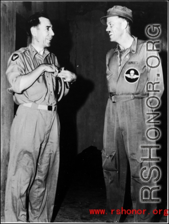 Two American US Army Air Force flyers chat in the CBI during WWII.