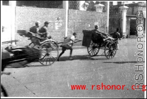 Rickshaws on the road in the CBI during WWII.