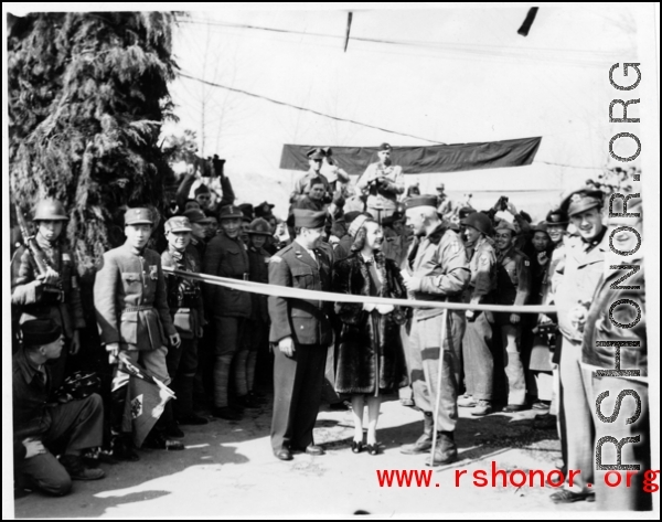 American and Chinese VIPs cut tape on the Burma Road during WWII.