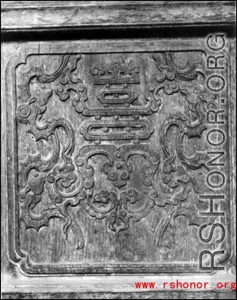 A carved wooden door panel in China. During WWII.  From the collection of Frank Bates.