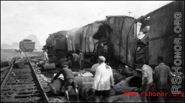 Allied gas train at the edge of the field, Liuzhou (Luichow), China Sept 1944, after a Japanese bombing raid, during WWII.