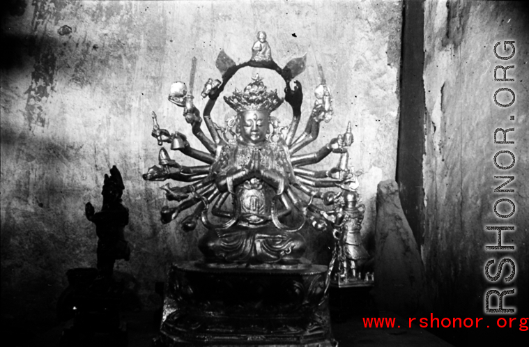 Buddhist statue in a temple in Yunnan, China, during WWII.