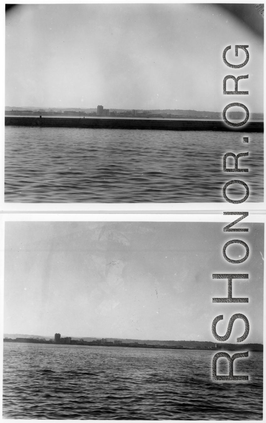 View across waterway to fortress.  Scenes in India witnessed by American GIs during WWII. For many Americans of that era, with their limited experience traveling, the everyday sights and sounds overseas were new, intriguing, and photo worthy.