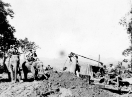 Elephants and bulldozers in North Burma in 1944.  US Army Photo.