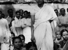 Village inhabitants in India listen attentively to headman who has assembled them.  Photo from Delbert Wood.