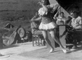 A woman dances for the troops in the CBI during WWII.