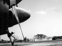 View of an Allied base from the nose of a P-38 in SW China or Burma, during WWII.