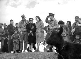 US soldiers host two charming VIP guests (one of which appears to be Dorothy Yuen Leub). In the China during WWII. 