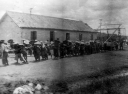 Chinese laborers pull a heavy concrete roller at an American base in China during WWII: "All the runways in China were made of crushed stone. They started the base with the larger stone and each layer that was added was of a smaller stone. The final layer of the runway surface was was made of finely crushed stone that was rolled and rerolled by Chinese coolies pulling a huge stone roller as shown in this picture. One of the big problems with our runways was the larger stone kept working their way to the sur