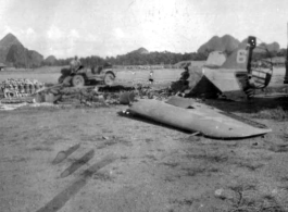 Burned American fighter, a P-51 or P-40, in Guangxi, China.