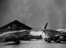 P-51s in snow at the American base at Luliang in China during WWII.