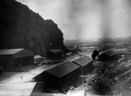 "Our First Home In China--This is a picture of our engineering area at Kwelin [Guilin],China. This was our first stop after leaving Kunming in January 1944. We had crews on detached service on bases at Hengyang, Chickiang, Chanyi, Ankang, Luichow, Nanning and Tanchuck. We were proud of the work performed at Kwelin. We built eight P-40's from the scrap-yard and turned them over to the line outfits to be returned to action." Caption courtesy of Elmer Bukey.