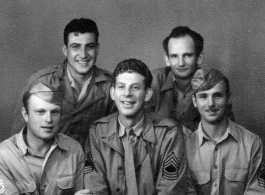 Some members of the 12th Air Service Group pose. During WWII.