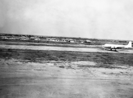 A C-54 on a runway in the CBI, probably Assam, India.    From the collection of David Firman, 61st Air Service Group.