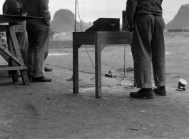 A film crew records the landing of an American fighter plane at Guilin during WWII.