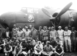 American flyers and mechanics, ground support, etc. gather for a group photo before a Ringer Squadron B-25 Mitchell. Yangkai, May or June 1944?