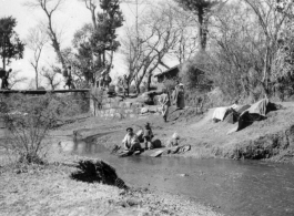 Bashful washers, the day of the mounds, South of Yangkai, Spring 1945.   From the collection of Frank Bates.