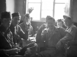 Scenes around Kunming city, Yunnan province, China, during WWII: GIs enjoy meal and drinks.