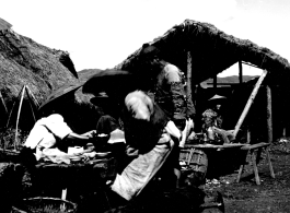 Outdoor restaurant stands in Yunnan, during WWII.