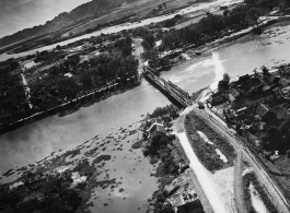 Bombing of Phy Ly railway bridge in French Indochina (Vietnam), during WWII. In northern Vietnam, and along a critical rail route used by the Japanese.