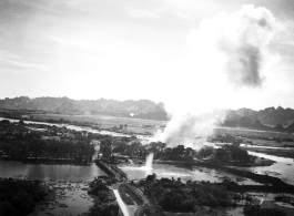 Bombing of Phy Ly railway bridge in French Indochina (Vietnam), during WWII. In northern Vietnam, and along a critical rail route used by the Japanese.