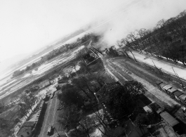 Bombing on Phu Lang Thuong railway bridge over the Thuong River at Bắc Giang City in French Indochina (Vietnam), during WWII. In northern Vietnam, and along a critical rail route used by the Japanese.  Coordinates:  21°16'32.69"N 106°11'9.28"E