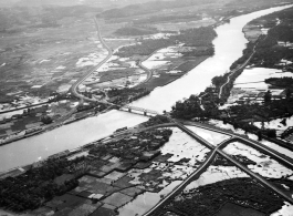 Bombing of Đò Lèn Bridge in Hà Trung Town in French Indochina (Vietnam), during WWII. In northern Vietnam, and along a critical rail route used by the Japanese.