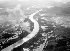 Bombing of Đò Lèn Bridge in Hà Trung Town in French Indochina (Vietnam), during WWII. In northern Vietnam, and along a critical rail route used by the Japanese.