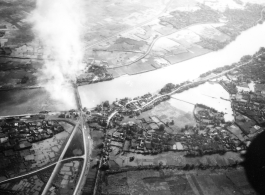 Bombing of Đò Lèn Bridge in Hà Trung Town in French Indochina (Vietnam), during WWII. In northern Vietnam, and along a critical rail route used by the Japanese.