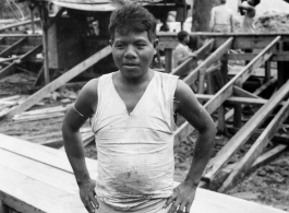 Local people in Burma near the 797th Engineer Forestry Company--A local worker or contract employee at the GI sawmill in Burma.  During WWII.