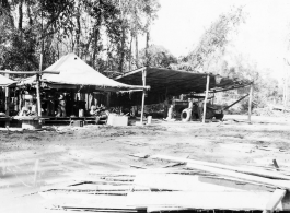 797th Engineer Forestry Company e truck repair and machine shop at camp in Burma.  During WWII.