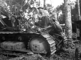 797th Engineer Forestry Company in Burma, repair bulldozer used for logging for bridge building along the Burma Road.  During WWII.