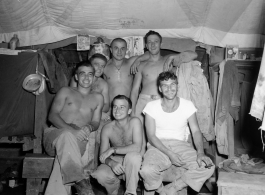 Engineers of the 797th Engineer Forestry Company pose in their barracks/tent in Burma.  During WWII.