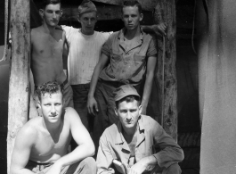 Engineers of the 797th Engineer Forestry Company pose in their tent in Burma.  During WWII.