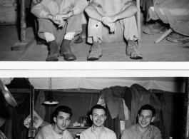 Engineers of the 797th Engineer Forestry Company pose in their barracks/tent in Burma.  During WWII.